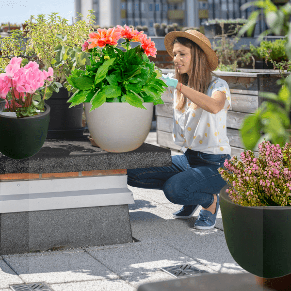 woman gardening on rooftop
